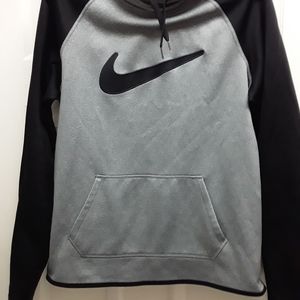 Women's Nike Medium Hoodie W/ Thumb holes.
